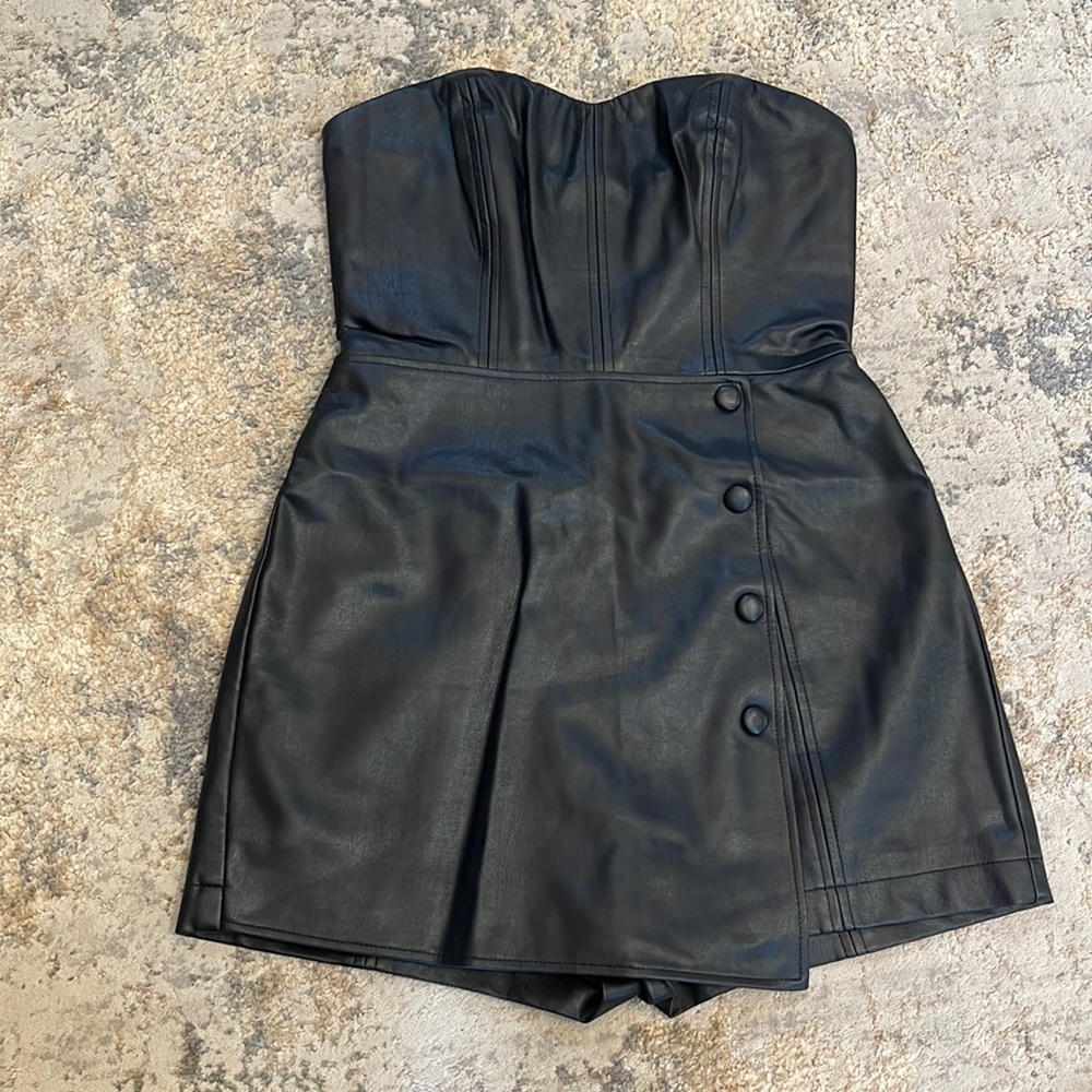Black faux leather dress. Size small. Great condition.